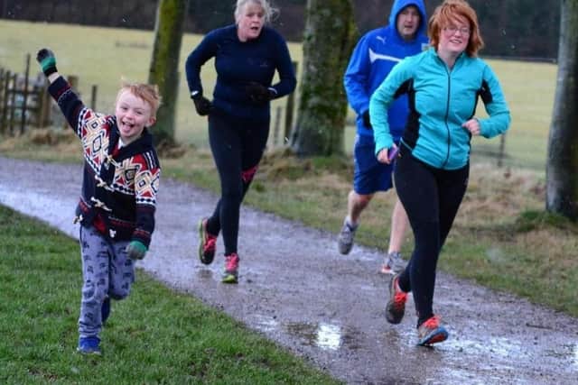 George Webster taking part in Burnley parkrun in Towneley Park at five-years-old. Photo by David Belshaw.