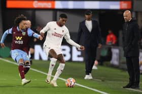 BURNLEY, ENGLAND - SEPTEMBER 23: Marcus Rashford of Manchester United in action with Luca Koleosho of Burnley during the Premier League match between Burnley FC and Manchester United at Turf Moor on September 23, 2023 in Burnley, England. (Photo by Matthew Peters/Manchester United via Getty Images)