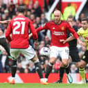 MANCHESTER, ENGLAND - APRIL 27: Christian Eriksen of Manchester United in action with Josh Cullen of Burnley during the Premier League match between Manchester United and Burnley FC at Old Trafford on April 27, 2024 in Manchester, England. (Photo by Matthew Peters/Manchester United via Getty Images)