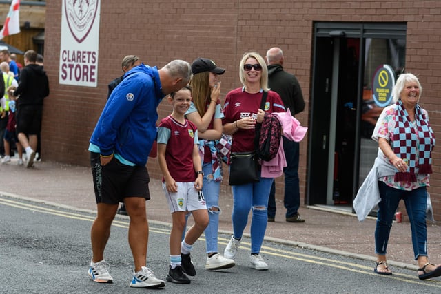 Burnley fans arrive at Turf Moor ahead of the home fixture against Luton Town. Photo: Kelvin Stuttard