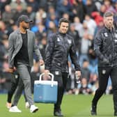Burnley manager Vincent Kompany (Ctr) makes his way to the dugout with his coaching staff

The EFL Sky Bet Championship - Burnley v Swansea City - Saturday 15th October 2022 - Turf Moor - Burnley