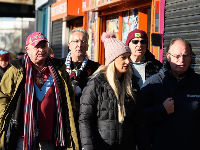 Burnley fans arrive at Turf Moor ahead of the Championship fixture with Blackburn Rovers which ended in a 3-0 victory for the Clarets. Photo: Kelvin Stuttard