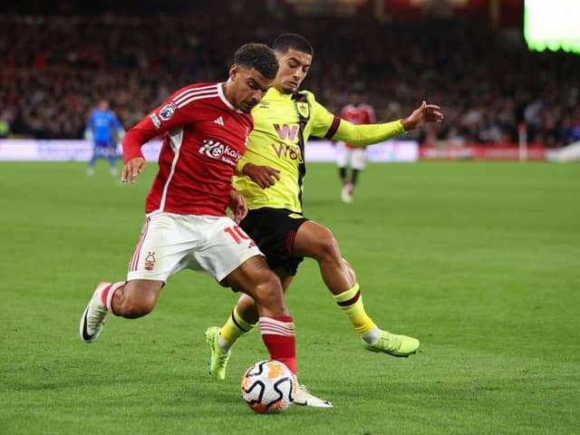 NOTTINGHAM, ENGLAND - SEPTEMBER 18:  Morgan Gibbs-White of Nottingham Forest in action with Anass Zaroury of Burnley during the Premier League match between Nottingham Forest and Burnley FC at City Ground on September 18, 2023 in Nottingham, United Kingdom. (Photo by Marc Atkins/Getty Images)