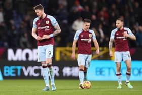 BURNLEY, ENGLAND - MARCH 01: Wout Weghorst of Burnley looks dejected following James Maddison of Leicester City's (not pictured) first goal during the Premier League match between Burnley and Leicester City at Turf Moor on March 01, 2022 in Burnley, England. (Photo by Lewis Storey/Getty Images)