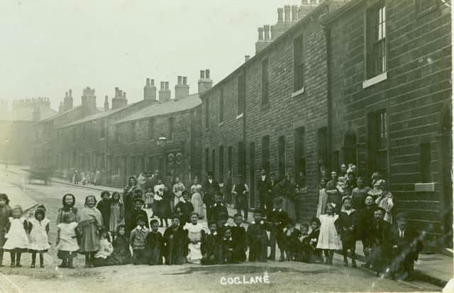 Residents of Cog Lane, Burnley (c.1890). Credit: Lancashire County Council
