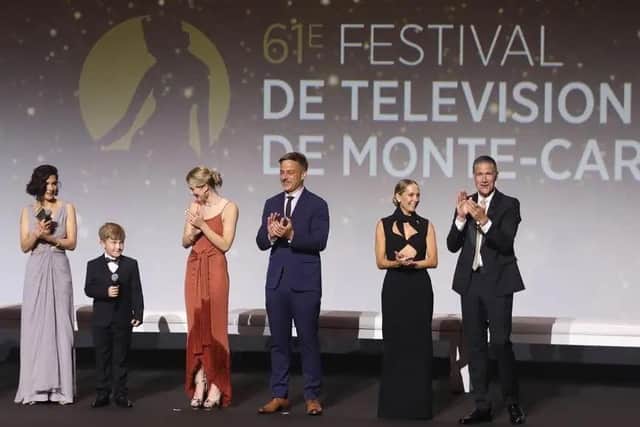Taylor Fay on stage at the Monte Carlo Television Festival with the cast of 'Last Light'