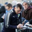 BURNLEY, ENGLAND - JANUARY 01: Dean Marney of Burnley signs autographs as he arrives at the stadium prior to the Premier League match between Burnley and Liverpool at Turf Moor on January 1, 2018 in Burnley, England.  (Photo by Ian MacNicol/Getty Images)