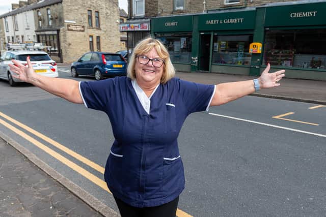 Pharmacy dispenser Carole Livesey is one of the best known faces in Burnley's Rosegrove after 46 years working at Bailey and Garrett's chemist. Photo: Kelvin Lister-Stuttard