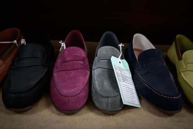 Men's shoes. (Photo by PHILIPPE LOPEZ/AFP via Getty Images)