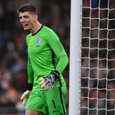 England's goalkeeper Nick Pope gestures during the international friendly football match between England and Ivory Coast at Wembley stadium in north London on March 29, 2022. - - NOT FOR MARKETING OR ADVERTISING USE / RESTRICTED TO EDITORIAL USE (Photo by Glyn KIRK / AFP) / NOT FOR MARKETING OR ADVERTISING USE / RESTRICTED TO EDITORIAL USE (Photo by GLYN KIRK/AFP via Getty Images)