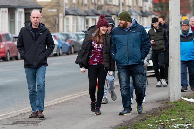 Burnley fans arrive at Turf Moor ahead of the Championship fixture with Wigan Athletic. Photo: Kelvin Stuttard