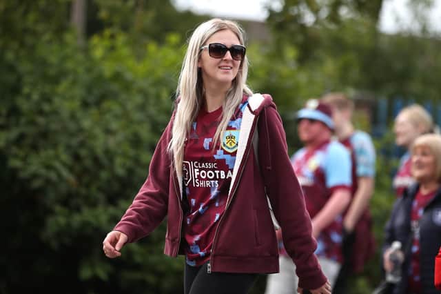 BURNLEY, ENGLAND - AUGUST 06: A supporter of Burnley looks on ahead of kickoff during the Sky Bet Championship match between Burnley and Luton Town at Turf Moor on August 06, 2022 in Burnley, England. (Photo by Ashley Allen/Getty Images)