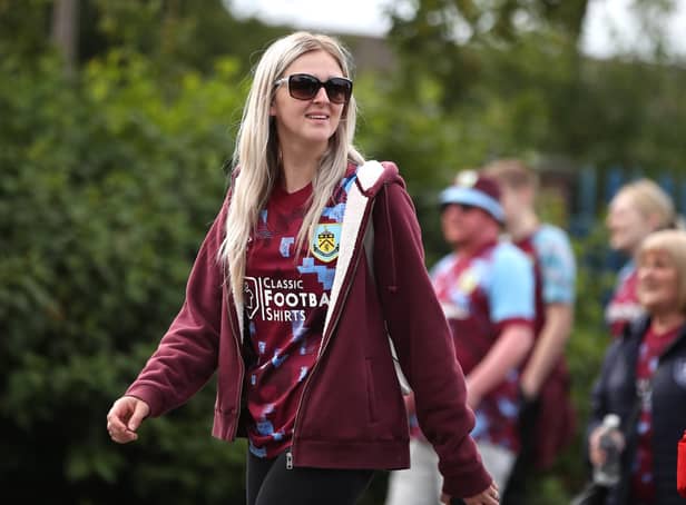 BURNLEY, ENGLAND - AUGUST 06: A supporter of Burnley looks on ahead of kickoff during the Sky Bet Championship match between Burnley and Luton Town at Turf Moor on August 06, 2022 in Burnley, England. (Photo by Ashley Allen/Getty Images)