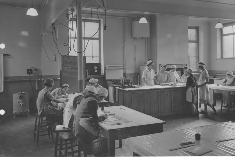 Heasandford Senior School For Girls, newly opened and refurbished. Pictured are pupils in the new Domestic Science classroom around 1937.
Credit: Lancashire County Council.