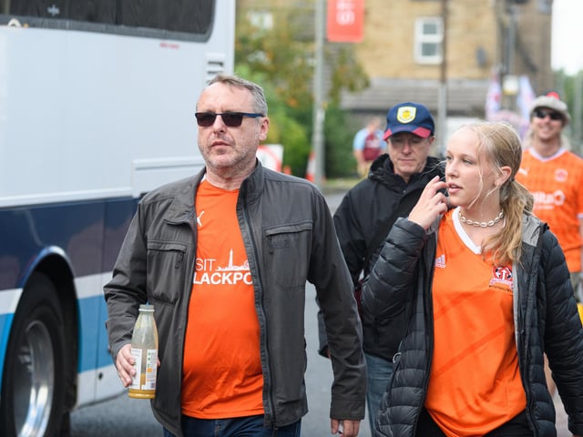 Blackpool fans arrive at Turf Moor ahead of the fixture with Burnley. Photo: Kelvin Stuttard
