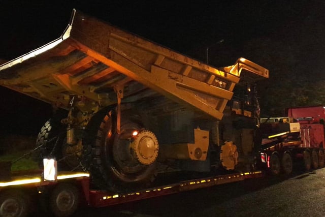 Police stopped this abnormal load as it travelled through Lancashire.
Comments on social media said: "A Caterpillar dump truck worth over £1million being moved by Laurel and Hardy, unbelievable!"