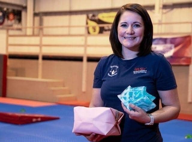 Period coach Sam Wright has appealed for Burnley gyms to provide free essential products for all females