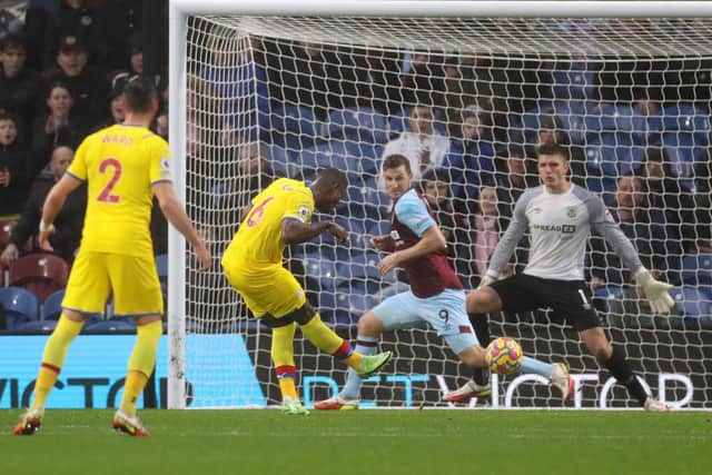 BURNLEY, ENGLAND - NOVEMBER 20: Marc Guehi of Crystal Palace scores their team's third goal past Chris Wood and Nick Pope of Burnley during the Premier League match between Burnley and Crystal Palace at Turf Moor on November 20, 2021 in Burnley, England. (Photo by Lewis Storey/Getty Images)