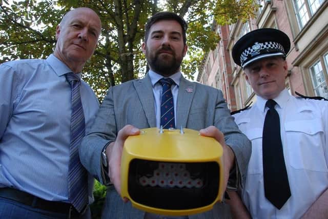 Showing off the average speed camera kit: Lancashire's deputy police and crime commissioner Andrew Pratt, Lancashire County Council highways and transport cabinet member Charlie Edwards and Lancashire Police Tactical Operations Unit Superintendent Mark Morley