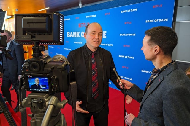 Actor Rory Kinnear chats to reporter Dominic Collis at the world premiere of Netflix movie Bank of Dave