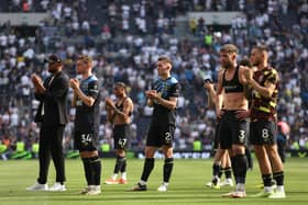 LONDON, ENGLAND - MAY 11: Burnley players and staff applauds the fans after the Premier League match between Tottenham Hotspur and Burnley FC at Tottenham Hotspur Stadium on May 11, 2024 in London, England. (Photo by Julian Finney/Getty Images)