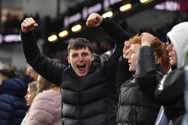 A Burnley fan celebrates at Turf Moor

The EFL Sky Bet Championship - Burnley v West Bromwich Albion - Friday 20th January 2023 - Turf Moor - Burnley