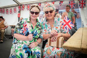These ladies are all set for a vintage weekend of music, fun and flag waving