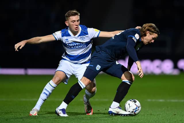 LONDON, ENGLAND - NOVEMBER 24: Danny Ward of Huddersfield Town and Jimmy Dunne of Queens Park Rangers compete for the ball during the Sky Bet Championship match between Queens Park Rangers and Huddersfield Town at The Kiyan Prince Foundation Stadium on November 24, 2021 in London, England. (Photo by Justin Setterfield/Getty Images)