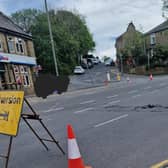 A section of Manchester Road in Burnley remains closed for flood repairs