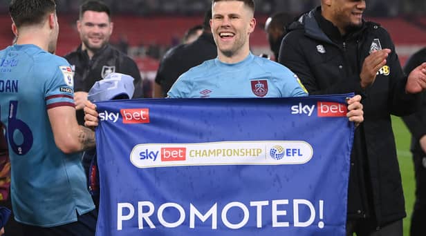 MIDDLESBROUGH, ENGLAND - APRIL 07: Burnley player Johan Berg Gudmundsson celebrates after being promoted back to the Premier League after the Sky Bet Championship between Middlesbrough and Burnley at Riverside Stadium on April 07, 2023 in Middlesbrough, England. (Photo by Stu Forster/Getty Images)