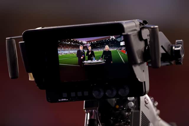 BIRMINGHAM, ENGLAND - SEPTEMBER 16: TV Pundits Jamie Carragher, Gary Neville and Kelly Cates present Friday night football during the Premier League match between Aston Villa and Southampton FC at Villa Park on September 16, 2022 in Birmingham, England. (Photo by Naomi Baker/Getty Images)