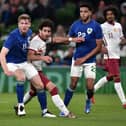 Nathan Collins of Republic of Ireland battles for possession with Ahmed Alaaeldin of Qatar during the International Friendly match between Republic of Ireland and Qatar. Typhoons built in Lancashire will provide air security during this winter's World Cup in Qatar