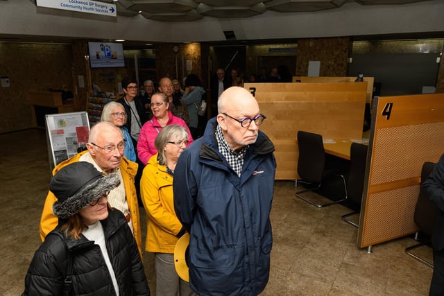Visitors queue to sign the book of condolence for The Queen at Wyre Civic Centre. Photo: Kelvin Stuttard