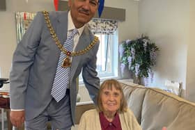 Mayor Coun. Raja Arif Khan with Edith Howson at Dove Court Care Home in Burnley.
