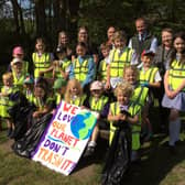 Pupils at Thorneyholme RC Primary School in Dunsop Bridge who were joined by staff, parents, a grandparent, governor and Duchy representatives for a big litter pick in the village.