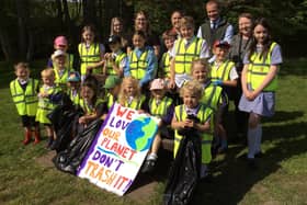 Pupils at Thorneyholme RC Primary School in Dunsop Bridge who were joined by staff, parents, a grandparent, governor and Duchy representatives for a big litter pick in the village.