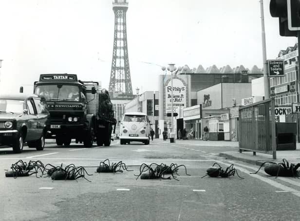 Ten giant spiders, which were starring in the BBC series at the time, stop the traffic on Blackpool Promenade as they make their way to the Dr Who Exhibition in 1974