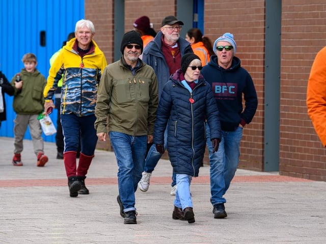 Burnley fans arrive at Turf Moor for the Premier League fixture against Brighton and Hove Albion. Photo: Kelvin Lister-Stuttard