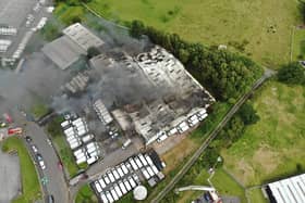 Firefighters are at the scene of a blaze at a commercial premises in Farrington Place, Burnley.