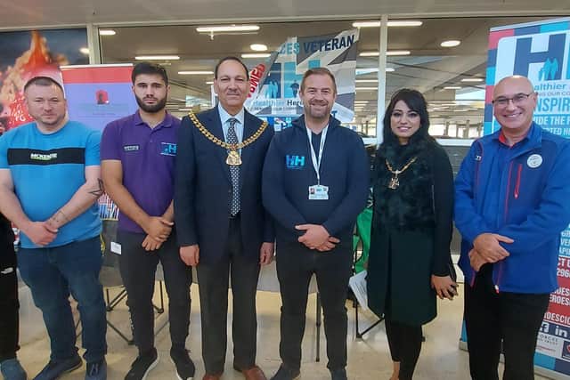 Mayor of Burnley Coun. Raja Arif Khan with member of the Healthier Heroes team at Burnley Tesco