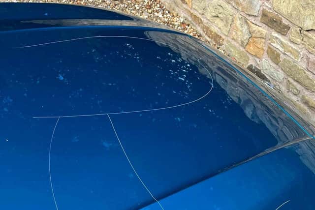 An image of the damage caused by vandals to Burnley social worker Darren Tahir's car