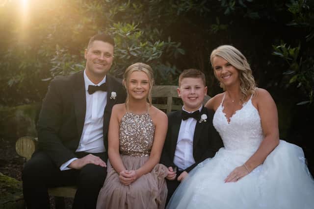 Burnley couple Victoria and Andrew Bennett, who tied the knot for the second time last month to honour Victoria's late grandfather, with their children Jack and Grace
