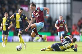 BURNLEY, ENGLAND - MARCH 03: Sander Berge of Burnley is challenged by Adam Smith of AFC Bournemouth during the Premier League match between Burnley FC and AFC Bournemouth at Turf Moor on March 03, 2024 in Burnley, England. (Photo by Alex Livesey/Getty Images)