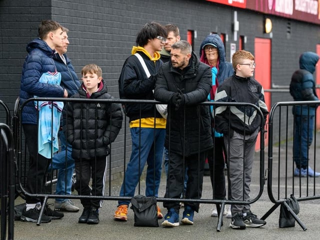 Burnley fans arrive at Turf Moor for the Premier League fixture against West Ham United. Photo: Kelvin Lister-Stuttard