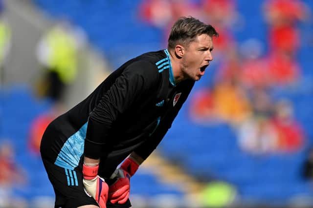 CARDIFF, WALES - JUNE 05: Wayne Hennessey of Wales reacts during the international friendly match between Wales and Albania at Cardiff City Stadium on June 05, 2021 in Cardiff, Wales. (Photo by Justin Setterfield/Getty Images)