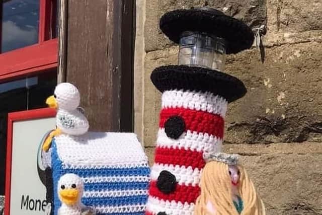 This amazing topper is currently on display outside Barnoldwick Post Office and the lighthouse even lights up at night