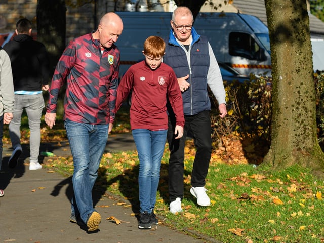 Burnley fans arrive at Turf Moor ahead of the Championship fixture with Blackburn Rovers which ended in a 3-0 victory for the Clarets. Photo: Kelvin Stuttard