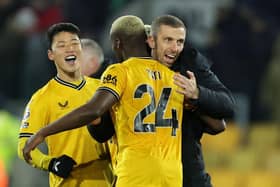 WOLVERHAMPTON, ENGLAND - DECEMBER 05: Gary O'Neil, Manager of Wolverhampton Wanderers, celebrates with Toti Gomes and Hwang Hee-Chan of Wolverhampton Wanderers following the team's victory during the Premier League match between Wolverhampton Wanderers and Burnley FC at Molineux on December 05, 2023 in Wolverhampton, England. (Photo by David Rogers/Getty Images)
