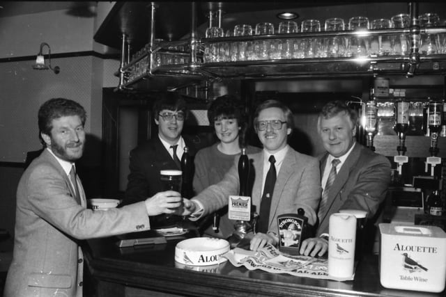 Cheers, Peter Hornby samples the first ever pint at Burnley's newest pub, General Scarlett. Behind the pumps were the new licensees Mr and Mrs Whitehead, CAMRA's representative Mr Crow, and general manager of Moorhouses Brewery Mr Malcolm MacDonald.
