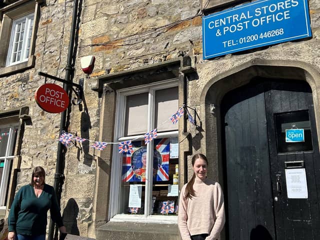 Postmistress Megan Hardcastle (left) who runs Slaidburn Central Stores and Post Office with her mum Clare (also pictured) has been invited to attend the Royal Garden Party